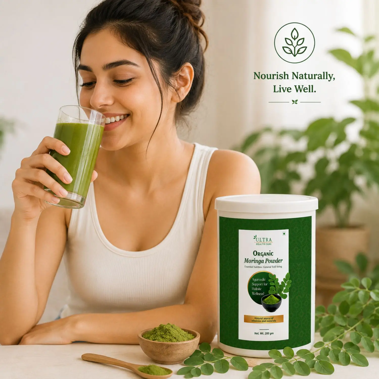 Woman drinking a green smoothie beside Ultra Health Care Organic Moringa Powder in a bright natural wellness setting.