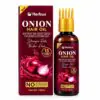 Herbus Onion Hair Oil 100 ml carton beside the amber bottle with its gold comb applicator cap